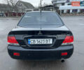 Чорний Міцубісі Lancer, об'ємом двигуна 1.58 л та пробігом 196 тис. км за 3800 $, фото 8 на Automoto.ua