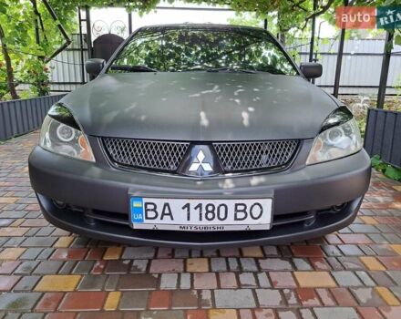 Чорний Міцубісі Lancer, об'ємом двигуна 1.58 л та пробігом 280 тис. км за 3950 $, фото 2 на Automoto.ua
