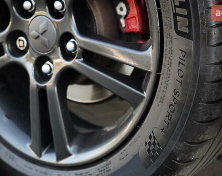 Черный Мицубиси Лансер, объемом двигателя 2 л и пробегом 253 тыс. км за 6900 $, фото 6 на Automoto.ua