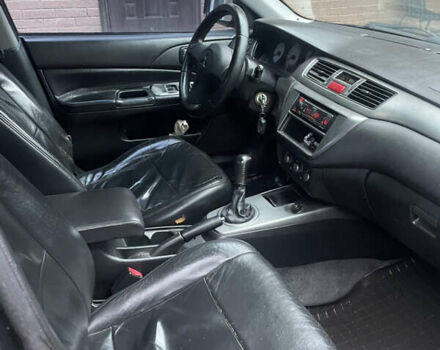 Чорний Міцубісі Lancer, об'ємом двигуна 1.59 л та пробігом 305 тис. км за 2950 $, фото 14 на Automoto.ua