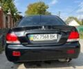 Чорний Міцубісі Lancer, об'ємом двигуна 1.6 л та пробігом 203 тис. км за 4600 $, фото 9 на Automoto.ua
