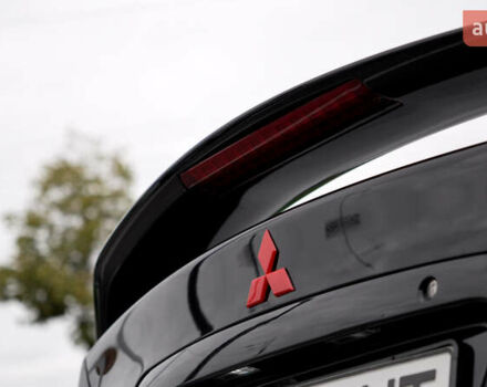 Черный Мицубиси Лансер, объемом двигателя 2 л и пробегом 253 тыс. км за 6900 $, фото 5 на Automoto.ua