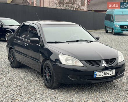 Чорний Міцубісі Lancer, об'ємом двигуна 1.58 л та пробігом 230 тис. км за 3350 $, фото 3 на Automoto.ua