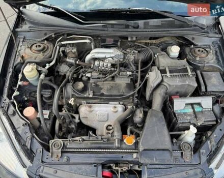 Черный Мицубиси Лансер, объемом двигателя 1.59 л и пробегом 221 тыс. км за 4200 $, фото 6 на Automoto.ua