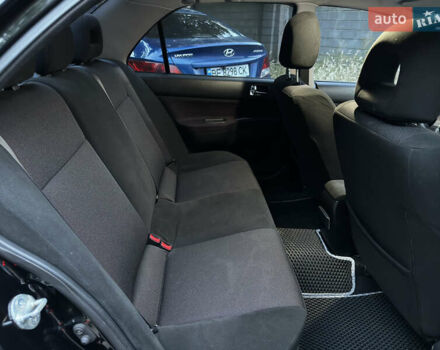 Черный Мицубиси Лансер, объемом двигателя 2 л и пробегом 255 тыс. км за 5000 $, фото 8 на Automoto.ua