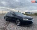 Чорний Міцубісі Lancer, об'ємом двигуна 1.6 л та пробігом 335 тис. км за 3500 $, фото 2 на Automoto.ua