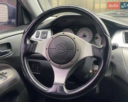 Чорний Міцубісі Lancer, об'ємом двигуна 2 л та пробігом 248 тис. км за 4990 $, фото 13 на Automoto.ua