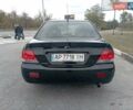 Черный Мицубиси Лансер, объемом двигателя 1.6 л и пробегом 207 тыс. км за 4500 $, фото 3 на Automoto.ua