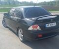 Чорний Міцубісі Lancer, об'ємом двигуна 2 л та пробігом 243 тис. км за 5250 $, фото 3 на Automoto.ua