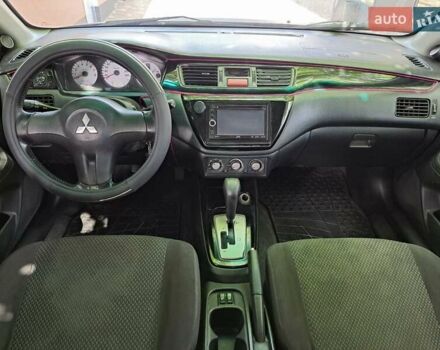 Чорний Міцубісі Lancer, об'ємом двигуна 1.58 л та пробігом 280 тис. км за 3950 $, фото 11 на Automoto.ua