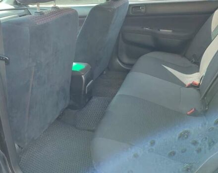 Черный Мицубиси Лансер, объемом двигателя 1.58 л и пробегом 128 тыс. км за 4600 $, фото 32 на Automoto.ua