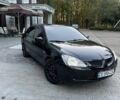 Черный Мицубиси Лансер, объемом двигателя 1.58 л и пробегом 230 тыс. км за 3800 $, фото 2 на Automoto.ua