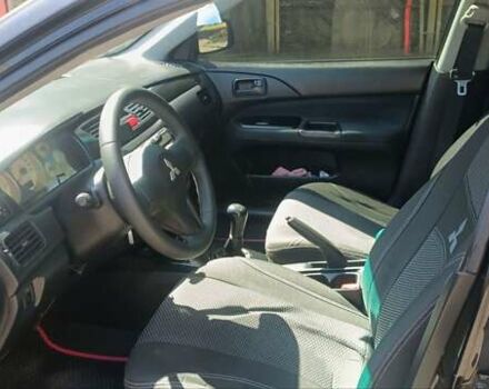 Чорний Міцубісі Lancer, об'ємом двигуна 1.6 л та пробігом 240 тис. км за 3900 $, фото 2 на Automoto.ua