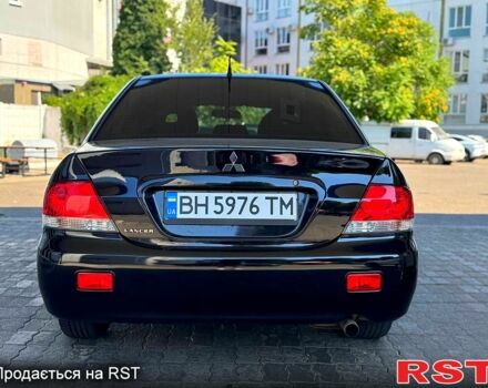 Чорний Міцубісі Lancer, об'ємом двигуна 1.6 л та пробігом 176 тис. км за 3777 $, фото 3 на Automoto.ua