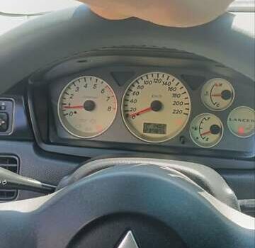 Чорний Міцубісі Lancer, об'ємом двигуна 1.6 л та пробігом 240 тис. км за 3900 $, фото 11 на Automoto.ua