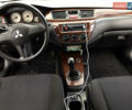 Мицубиси Лансер 2006 в Днепре (Днепропетровске) на Automoto.ua Черный Мицубиси Лансер, объемом двигателя 1.58 л и пробегом 166 тыс. км за 4800 $, фото 9 на Automoto.ua