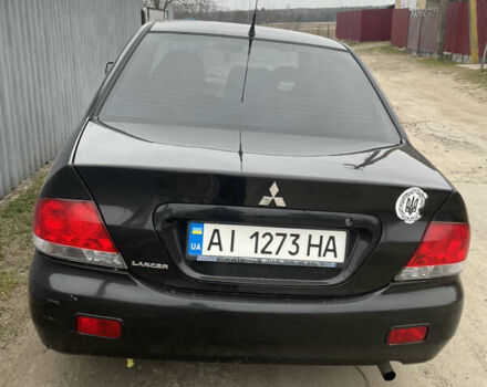 Чорний Міцубісі Lancer, об'ємом двигуна 1.58 л та пробігом 237 тис. км за 3800 $, фото 3 на Automoto.ua