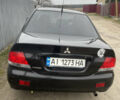 Чорний Міцубісі Lancer, об'ємом двигуна 1.58 л та пробігом 237 тис. км за 3500 $, фото 3 на Automoto.ua