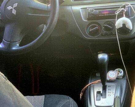 Черный Мицубиси Лансер, объемом двигателя 1.6 л и пробегом 285 тыс. км за 4400 $, фото 1 на Automoto.ua