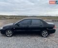 Чорний Міцубісі Lancer, об'ємом двигуна 1.6 л та пробігом 335 тис. км за 3500 $, фото 1 на Automoto.ua