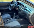 Черный Мицубиси Лансер, объемом двигателя 1.6 л и пробегом 227 тыс. км за 3750 $, фото 3 на Automoto.ua