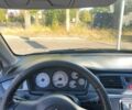 Чорний Міцубісі Lancer, об'ємом двигуна 1.58 л та пробігом 348 тис. км за 3999 $, фото 1 на Automoto.ua