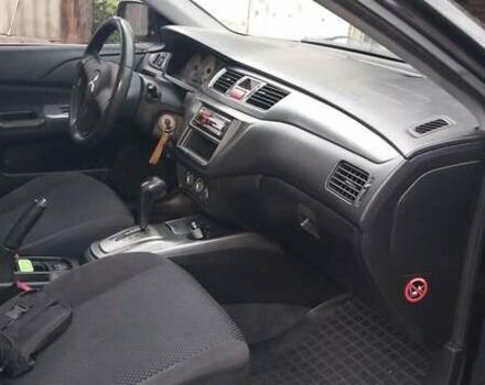 Чорний Міцубісі Lancer, об'ємом двигуна 1.59 л та пробігом 185 тис. км за 4900 $, фото 3 на Automoto.ua