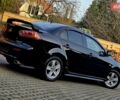 Чорний Міцубісі Lancer, об'ємом двигуна 2 л та пробігом 260 тис. км за 6555 $, фото 3 на Automoto.ua