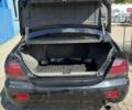 Чорний Міцубісі Lancer, об'ємом двигуна 1.59 л та пробігом 201 тис. км за 4000 $, фото 3 на Automoto.ua