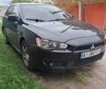 Черный Мицубиси Лансер, объемом двигателя 2 л и пробегом 277 тыс. км за 4650 $, фото 7 на Automoto.ua