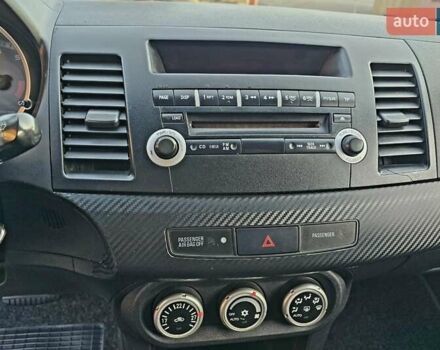 Чорний Міцубісі Lancer, об'ємом двигуна 2 л та пробігом 260 тис. км за 6555 $, фото 27 на Automoto.ua