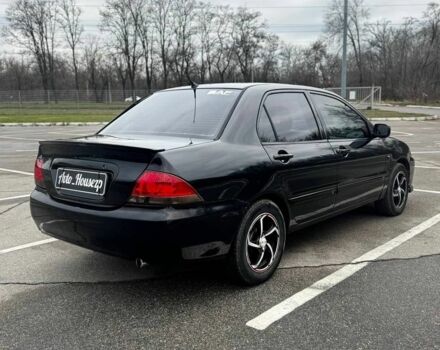 Чорний Міцубісі Lancer, об'ємом двигуна 0 л та пробігом 236 тис. км за 3600 $, фото 4 на Automoto.ua
