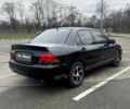 Чорний Міцубісі Lancer, об'ємом двигуна 0 л та пробігом 236 тис. км за 3600 $, фото 4 на Automoto.ua
