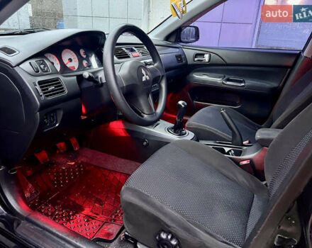 Чорний Міцубісі Lancer, об'ємом двигуна 1.6 л та пробігом 303 тис. км за 4350 $, фото 23 на Automoto.ua