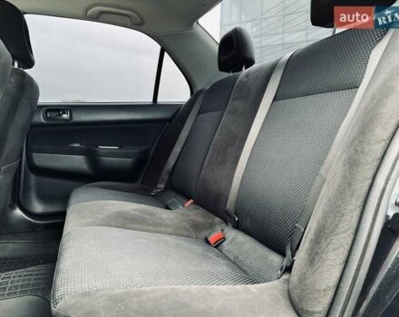 Чорний Міцубісі Lancer, об'ємом двигуна 1.6 л та пробігом 243 тис. км за 4950 $, фото 41 на Automoto.ua