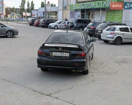 Чорний Міцубісі Lancer, об'ємом двигуна 2 л та пробігом 152 тис. км за 5500 $, фото 7 на Automoto.ua