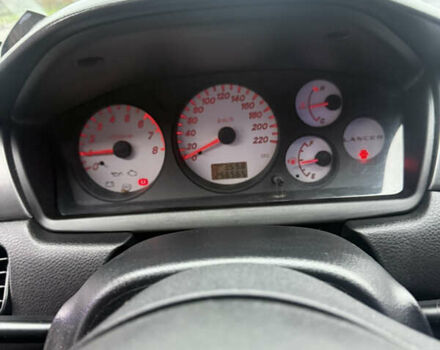 Чорний Міцубісі Lancer, об'ємом двигуна 1.58 л та пробігом 256 тис. км за 3700 $, фото 15 на Automoto.ua