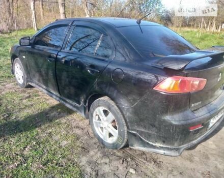 Чорний Міцубісі Lancer, об'ємом двигуна 2 л та пробігом 180 тис. км за 7300 $, фото 1 на Automoto.ua