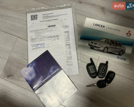 Чорний Міцубісі Lancer, об'ємом двигуна 1.6 л та пробігом 270 тис. км за 4500 $, фото 14 на Automoto.ua