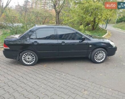 Чорний Міцубісі Lancer, об'ємом двигуна 1.58 л та пробігом 190 тис. км за 3750 $, фото 20 на Automoto.ua