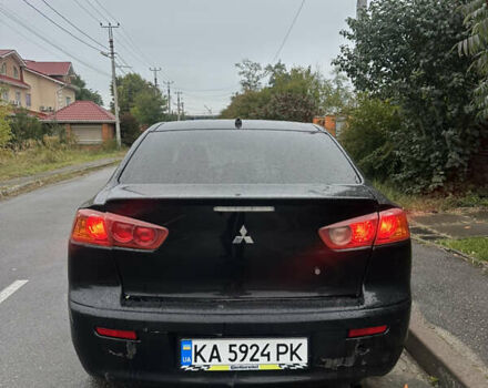 Чорний Міцубісі Lancer, об'ємом двигуна 2 л та пробігом 292 тис. км за 4400 $, фото 5 на Automoto.ua