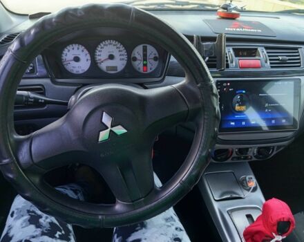 Чорний Міцубісі Lancer, об'ємом двигуна 1.6 л та пробігом 3 тис. км за 4500 $, фото 9 на Automoto.ua