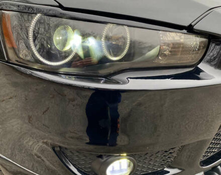 Черный Мицубиси Лансер, объемом двигателя 2 л и пробегом 164 тыс. км за 8300 $, фото 4 на Automoto.ua