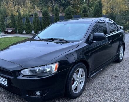 Чорний Міцубісі Lancer, об'ємом двигуна 2 л та пробігом 300 тис. км за 6185 $, фото 1 на Automoto.ua