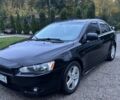 Чорний Міцубісі Lancer, об'ємом двигуна 2 л та пробігом 300 тис. км за 6185 $, фото 1 на Automoto.ua