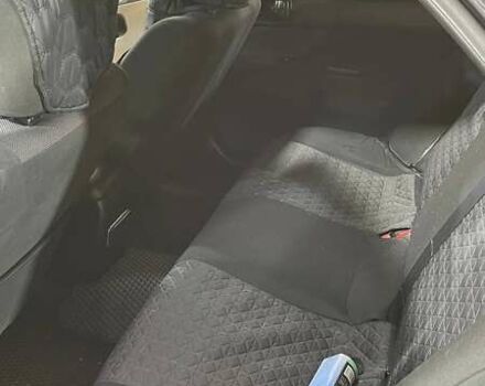 Черный Мицубиси Лансер, объемом двигателя 1.6 л и пробегом 249 тыс. км за 5000 $, фото 15 на Automoto.ua