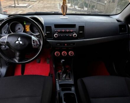Черный Мицубиси Лансер, объемом двигателя 2 л и пробегом 247 тыс. км за 4700 $, фото 9 на Automoto.ua