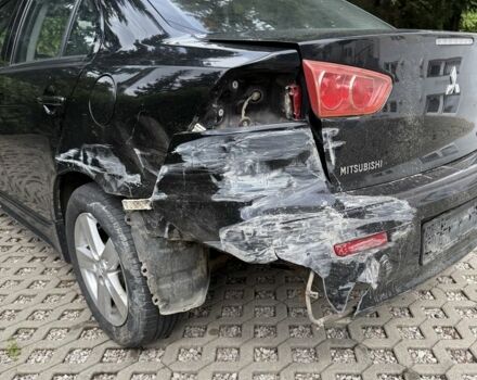 Чорний Міцубісі Lancer, об'ємом двигуна 2 л та пробігом 245 тис. км за 3500 $, фото 3 на Automoto.ua