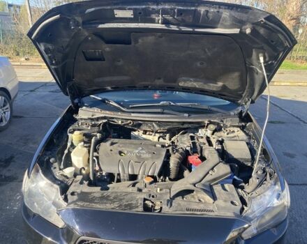 Черный Мицубиси Лансер, объемом двигателя 2 л и пробегом 372 тыс. км за 6200 $, фото 14 на Automoto.ua