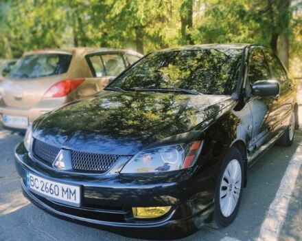 Чорний Міцубісі Lancer, об'ємом двигуна 1.6 л та пробігом 221 тис. км за 4600 $, фото 10 на Automoto.ua